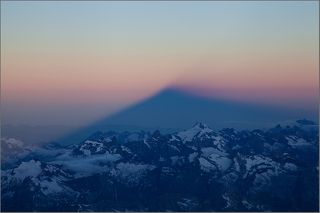 Утренняя тень от Эльбруса с высоты 5200 метров.