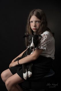 Portrait of a girl with a dog