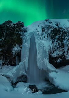Frozen Kirkjufellsfoss (Church Mountain Waterfall). Grundarfjörður, Snaefellsnes Peninsula, Iceland