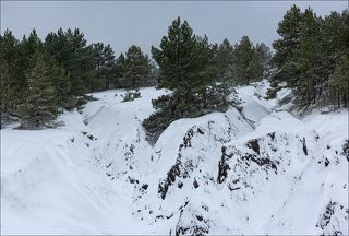 Старый карьер после ночного снегопада