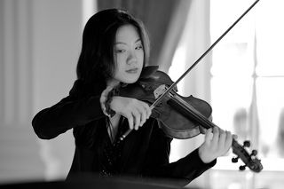 Closeup shot of a violinist during performance