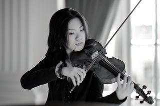 Closeup shot of a violinist during performance