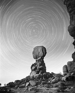 Balanced Rock and North Stars, from the Ethereal Days collection.

Single 35mm film exposure.   1/4 moon for ambient light.