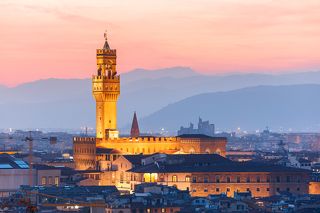 Famous tower of Palazzo Vecchio on the Piazza della Signoria at sunset from Piazzale Michelangelo in Florence, Tuscany, Italy