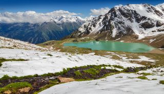 Таял июльский снег