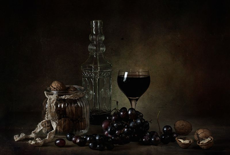 still life with a glass of wine and grapes, walnuts