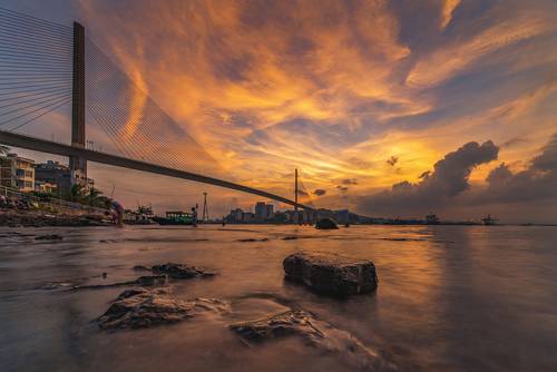 The Sunset at Bai Chay bridge in Vietnam