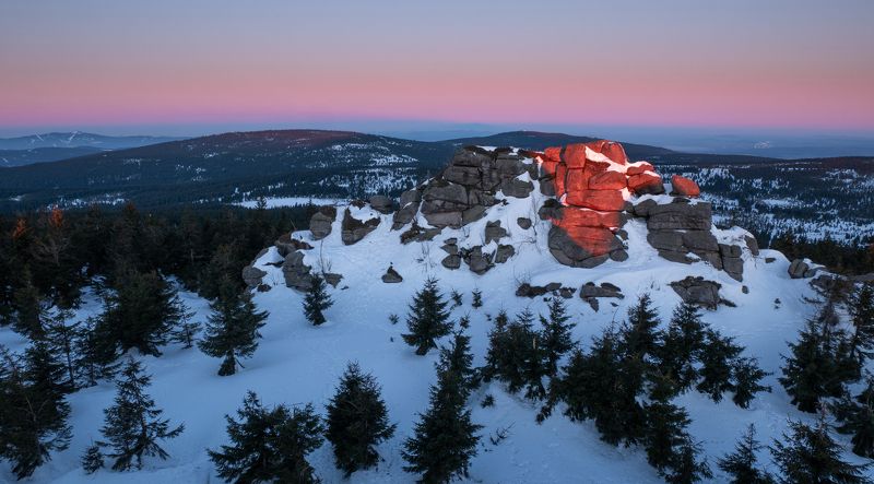 snow,sun,sunrise,sunrays,czech,cold,forest,peak,jizera,colours First light hitting the rockphoto preview