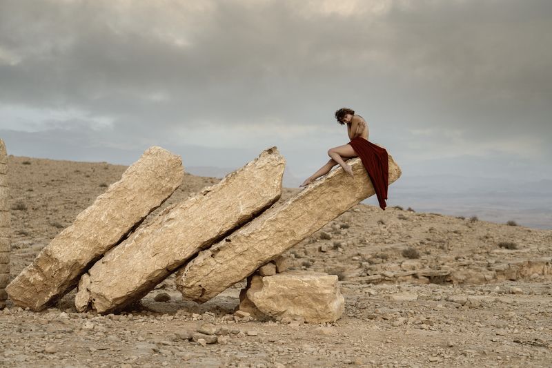 clouds, desert, dry, female, individuality, look, makhtesh ramon, mantle, naked, nude, one person, outdoors, pose, rocks, sculpture, side view, sitting, skies, stones, woman In Anticipation of the Stormphoto preview