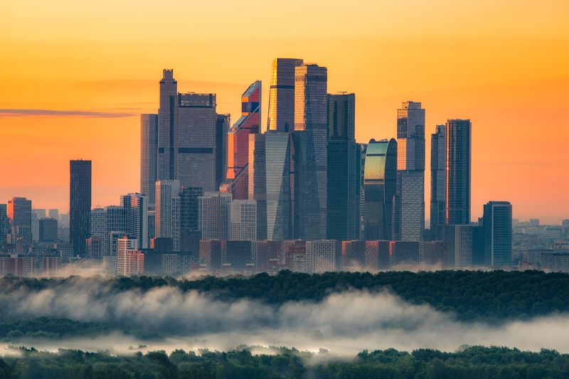 sunrise sun fireball architecture skyscrapers moscow cityscape city russia москва Morning hazephoto preview