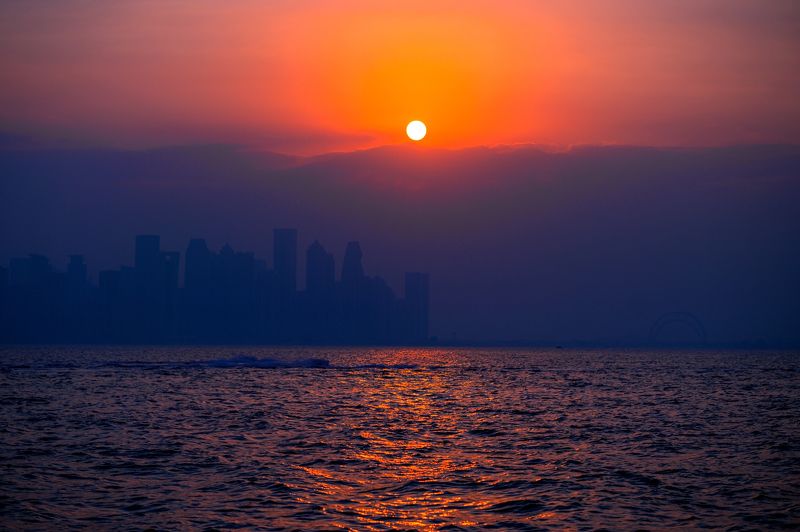 Sunset under the Doha city