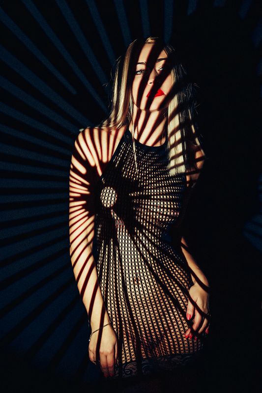 woman, portrait, conceptual, studio In the darkest sunlightphoto preview