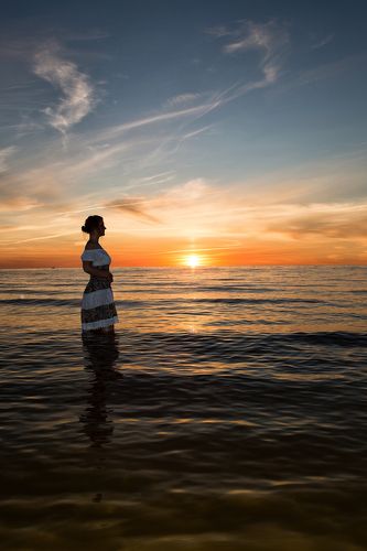 Girl at baltic sunset