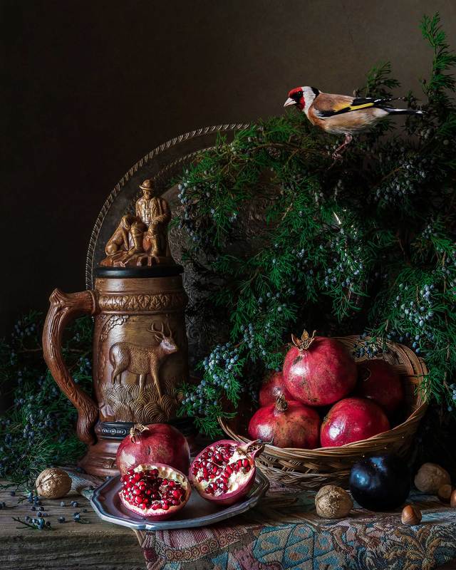 Still Life with Goldfinch and Pomerganates