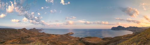 A Panorama of Silent Bay and Koktebel at sunset. Black Sea. Crimea