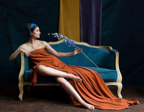 Lady with blue flower